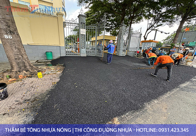 thảm bê tông nhựa nóng tại quận 2 bãi giữ xe, kho hàng. thảm bê tông nhựa nóng tại quận 2 bãi giữ xe, kho hàng.